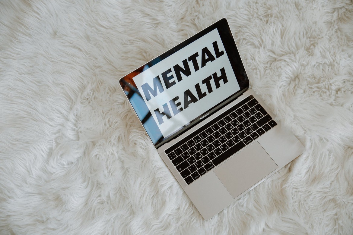 laptop with mental health text 