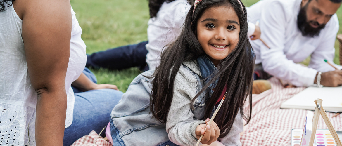 smiling child in a park setting