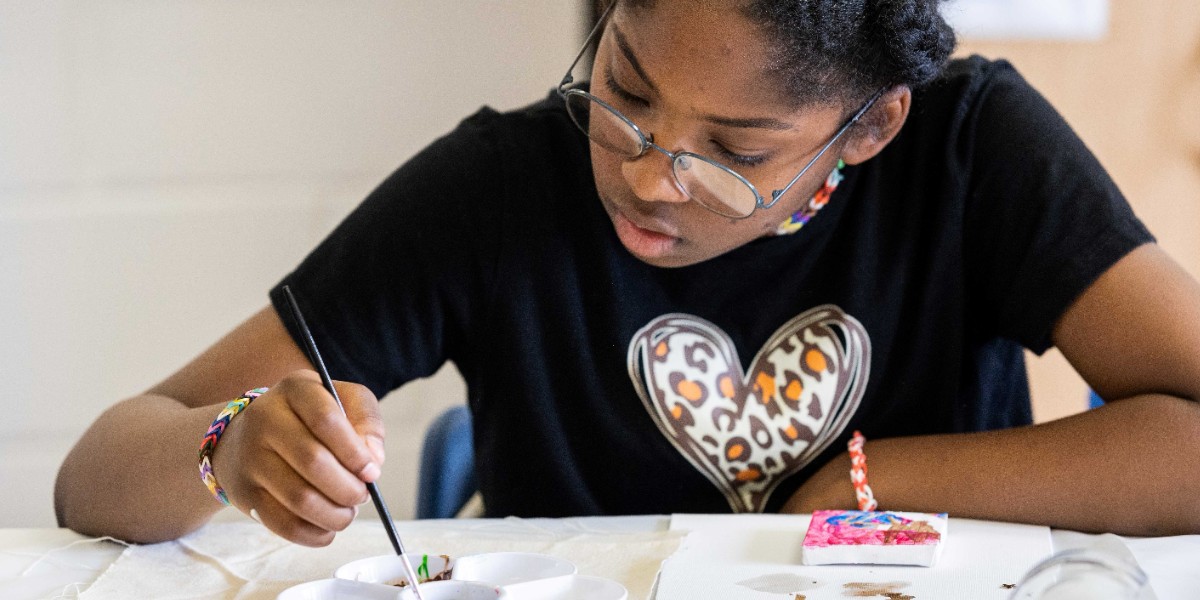 young person doing art work 