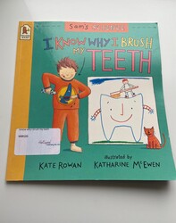 boy on the front demonstrating brushing teeth 