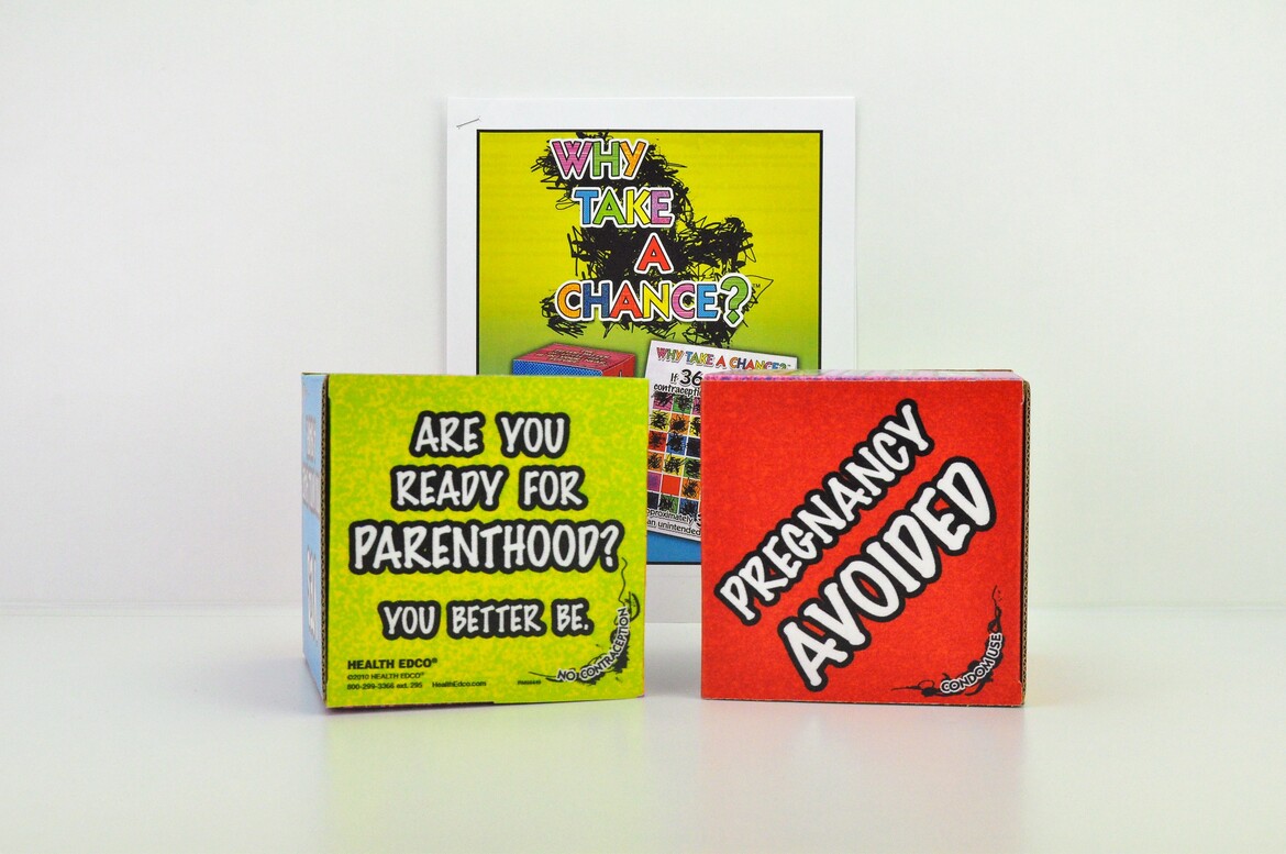 Two dice illustrating unplanned pregnancy
