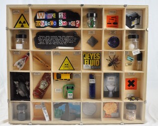 3D display with chemicals, insects to show what is in tobacco smoke