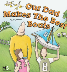 Dad with two young daughters outside stood in a field with one child holding a boat model 