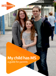 family consisting of mother, father and child stood outside 