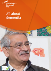 orange leaflet background with a image of a man titled All about dementia
