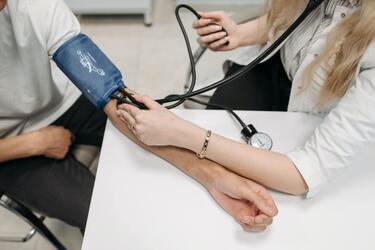 patient receiving blood pressure monitoring 