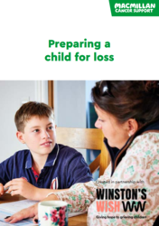 A person and a child sitting at the table 