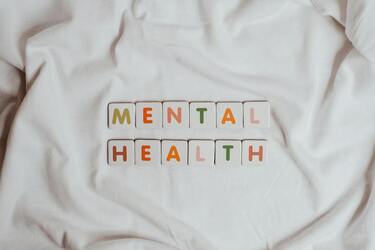 Word tiles spelling mental health 